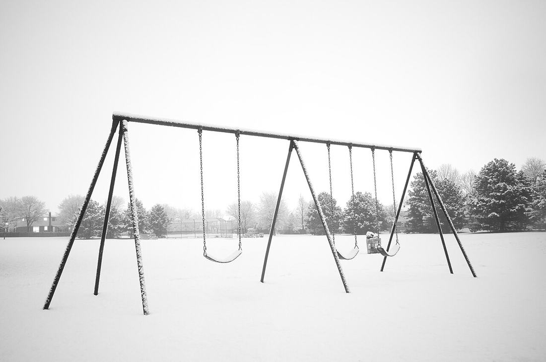 Empty swings in a public park