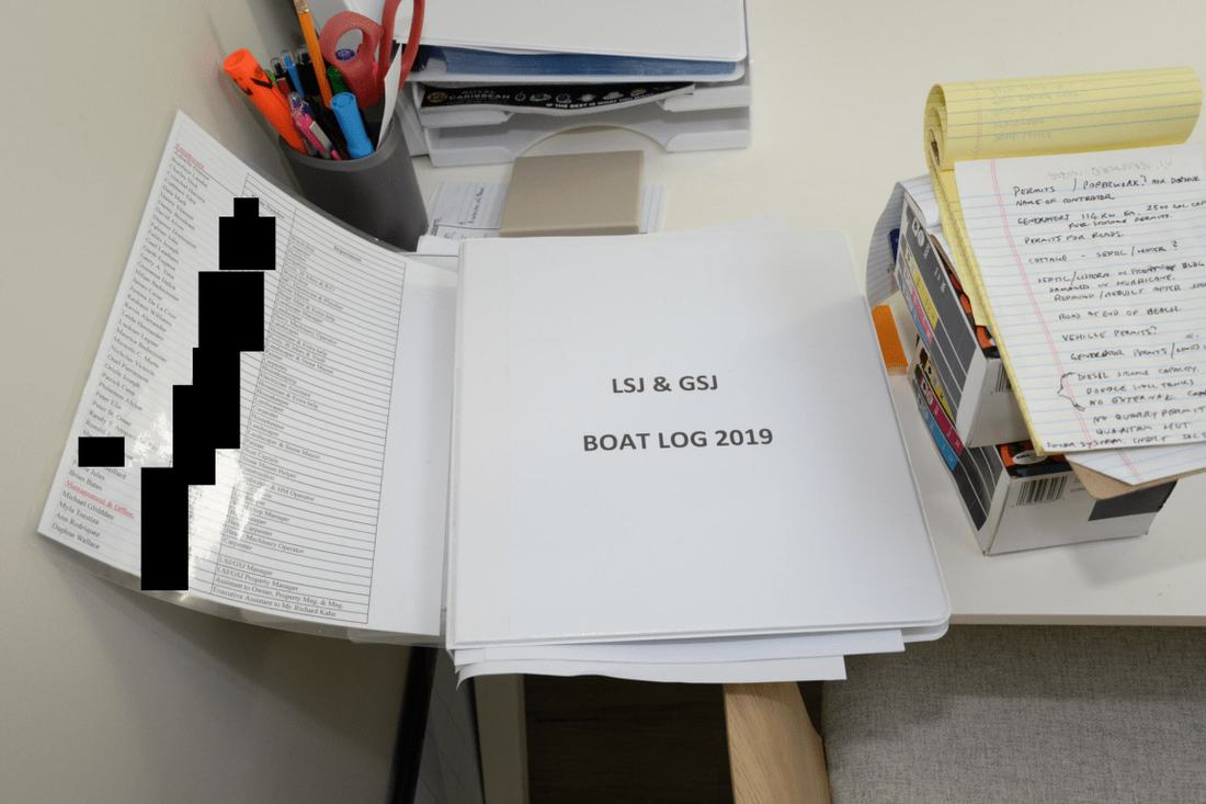 Papers and a pen on a desk