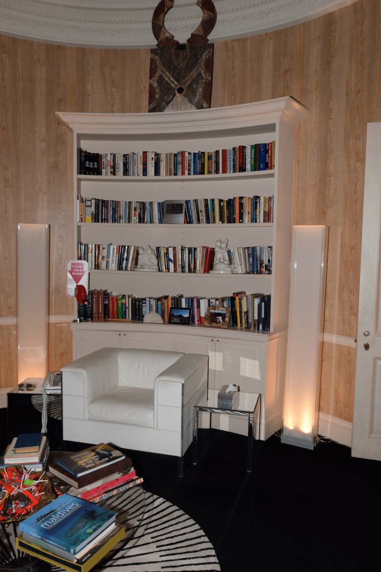 A quiet reading nook with a bookshelf
